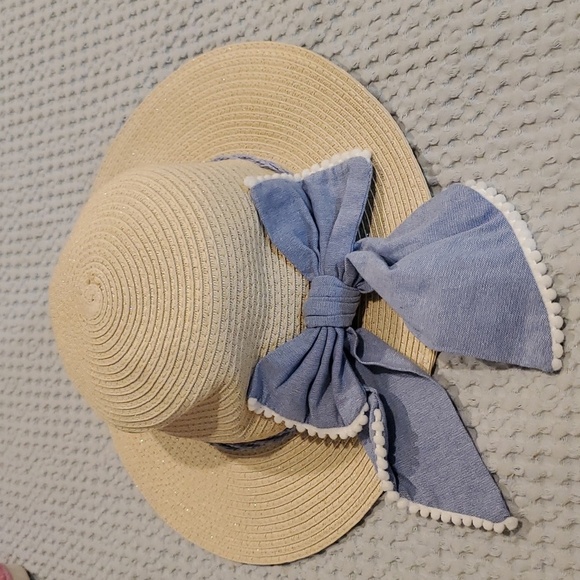 White dressy hat. New, pretty soft bow on the back. Soft blue denim in color. - Picture 2 of 4
